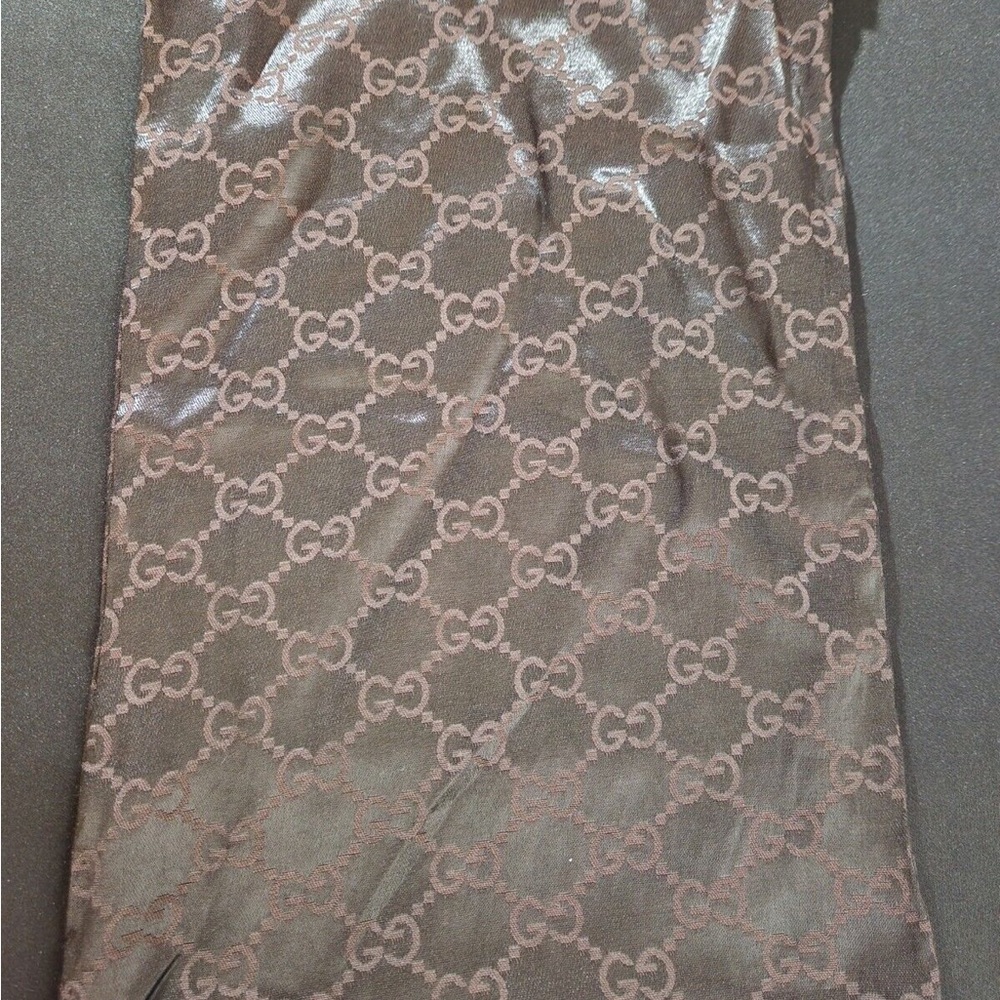 TWO GUCCI DUST BAGS
